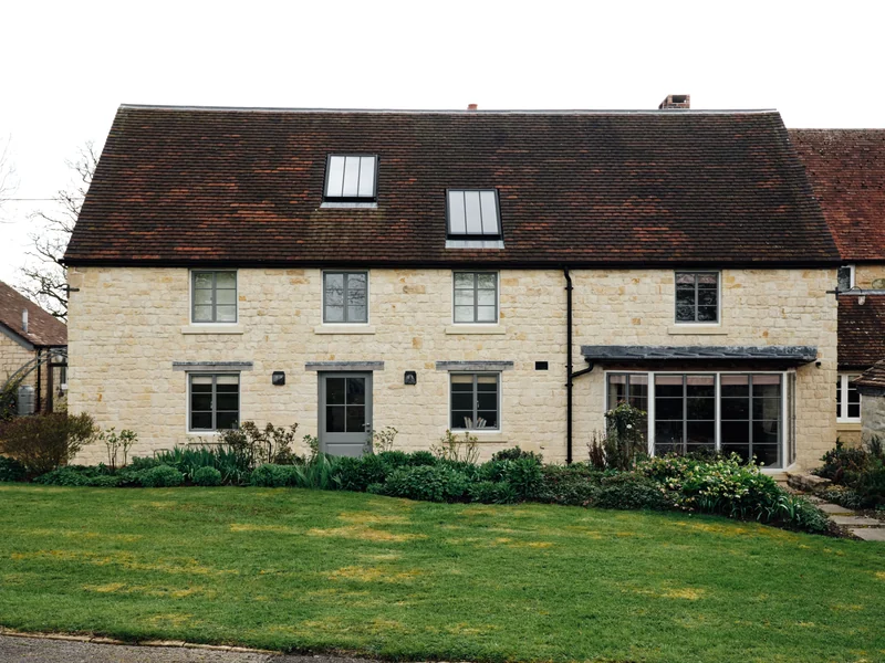Stone country house viewed from the garden